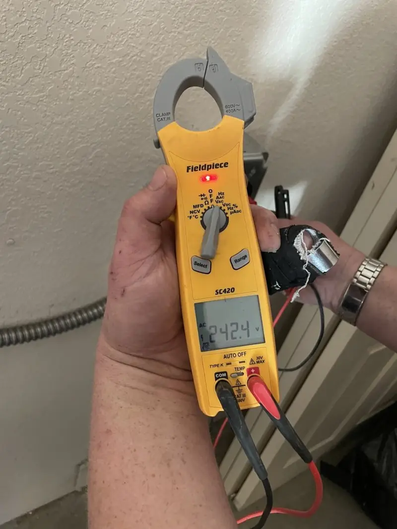 Voltage testing with clamp meter during Hot Tub / Pool Electrical Wiring in Clarinda